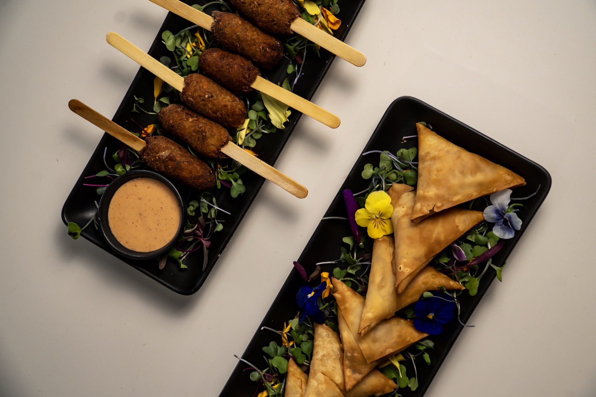 Samosas and kebab lollipops platter